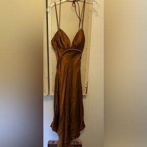 Copper calf-length halter dress.